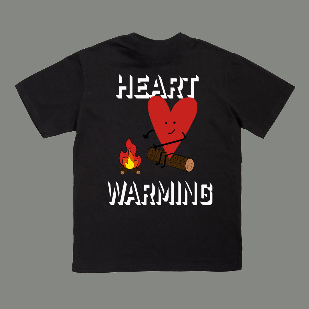 Black t-shirt with a heart and fire graphic and 'HEART WARMING' text on a gray background