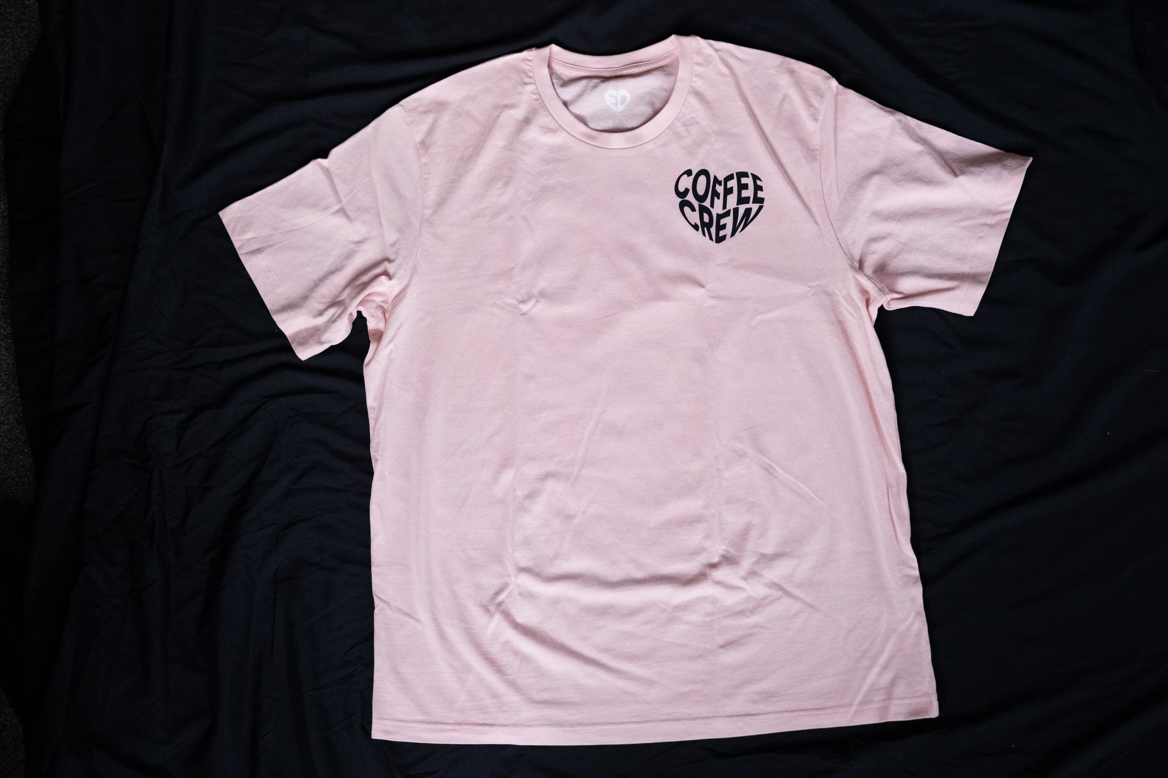 Pink t-shirt with 'Coffee Cream' text on a black background