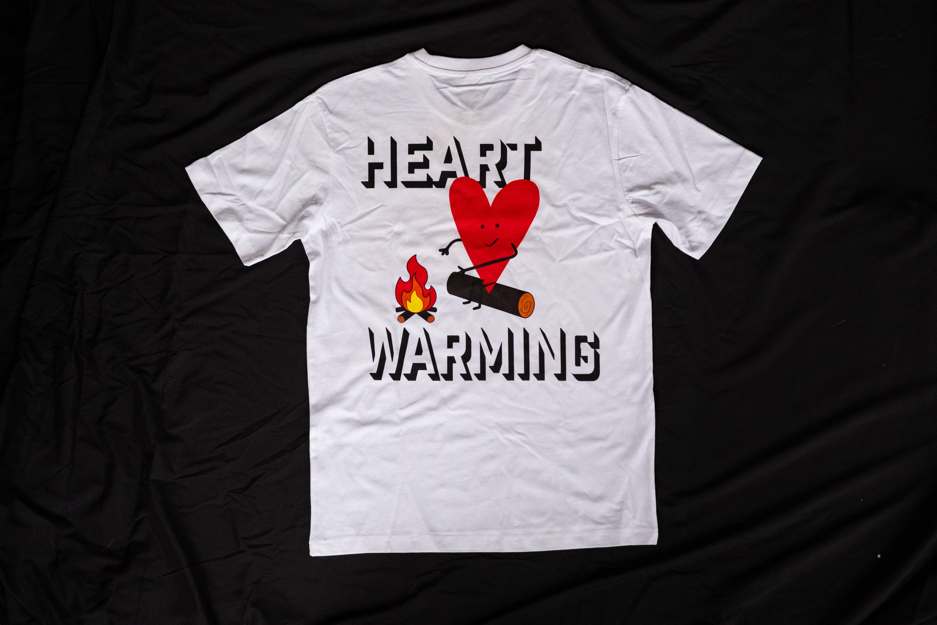 White t-shirt with a graphic design and text on a black background