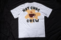 White t-shirt with 'Hot Choc Crew' design on a black background