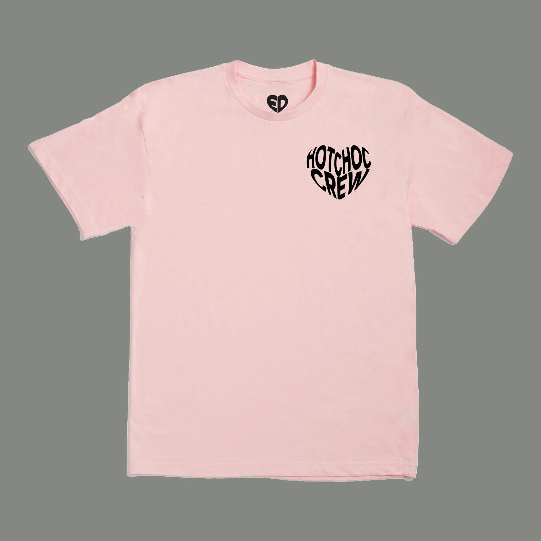 Pink t-shirt with black text on a gray background